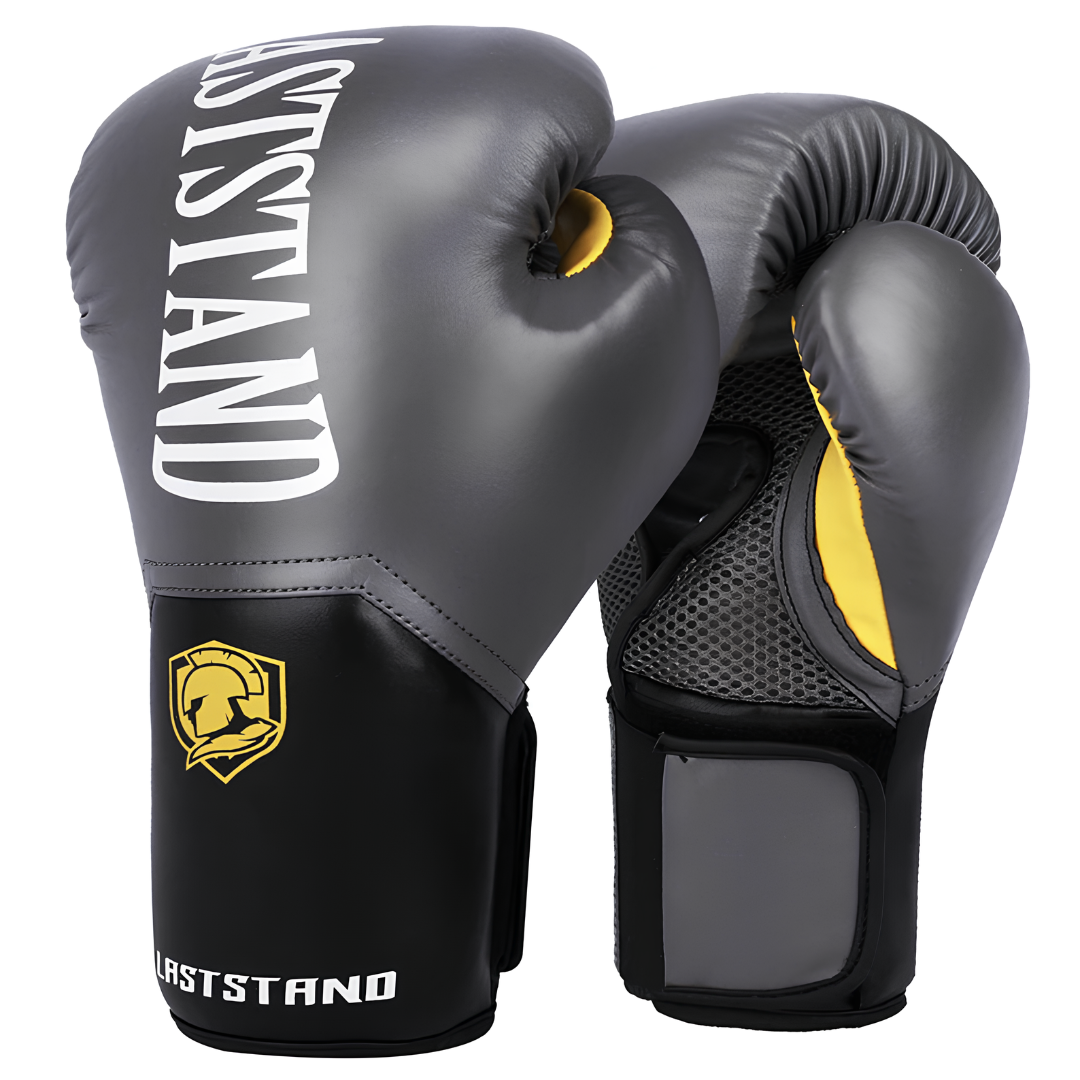 Gray boxing gloves with yellow highlights, durable and comfortable for various boxing styles.