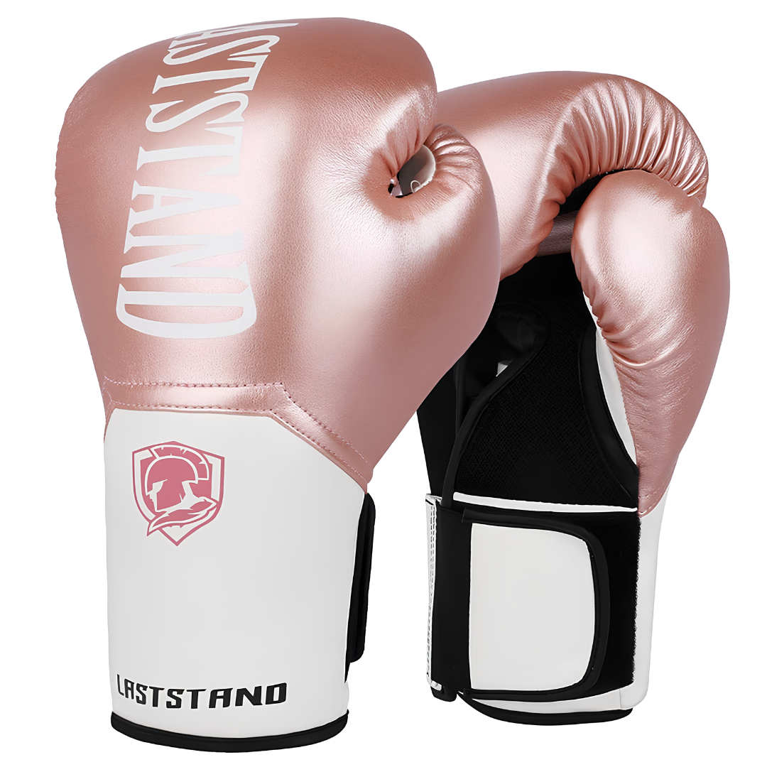 Pink boxing gloves with white accents, stylish and functional for women and children.