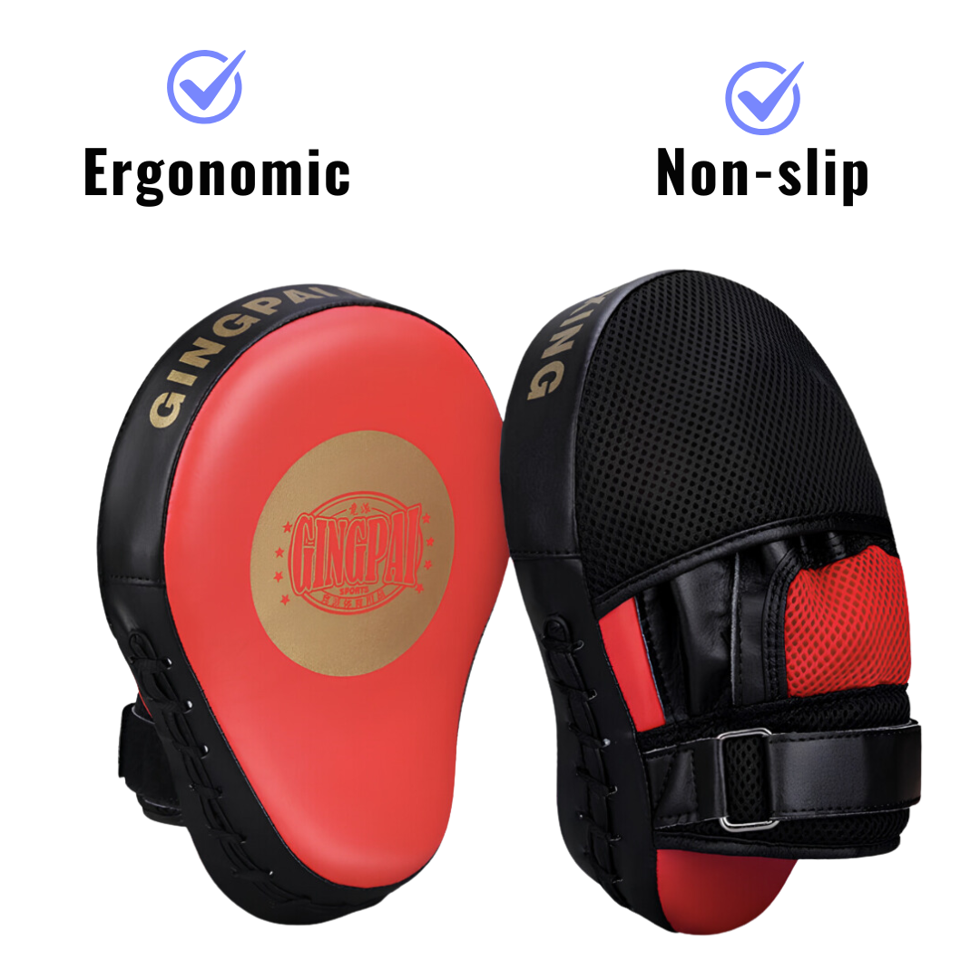 Ergonomic and non-slip red and black boxing mitts, ideal for precise and intense training sessions in combat sports.