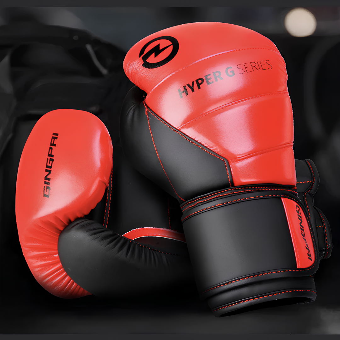 Hyper G Series boxing gloves with a red and black design, offering comfort and protection for training and competition.