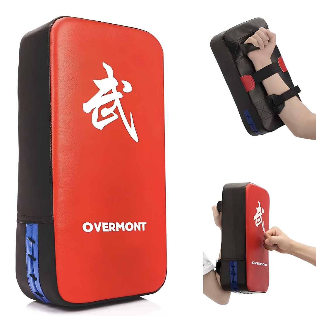 Professional red pad for boxing and combat training with a sturdy grip and elastic straps.