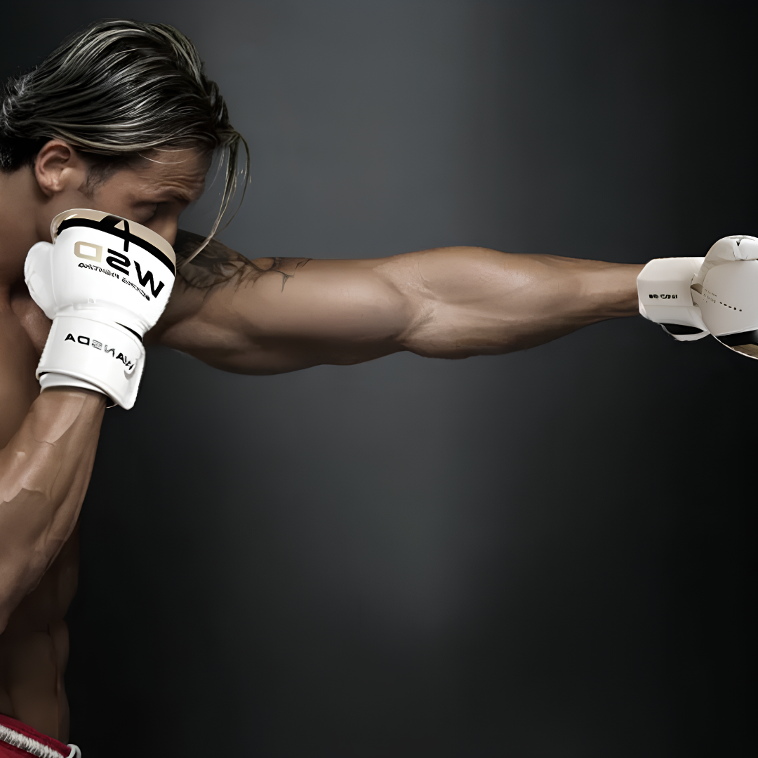 A man training in boxing with professional white boxing gloves, suitable for both professionals and beginners.